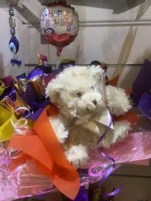 Chocolate Arrangement with soft cuddly teddy bear.
